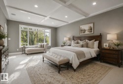 Spacious bedroom featuring a coffered ceiling with recessed lighting, a large window offering outdoor scenery, plush carpet flooring, and a decorative area rug - 