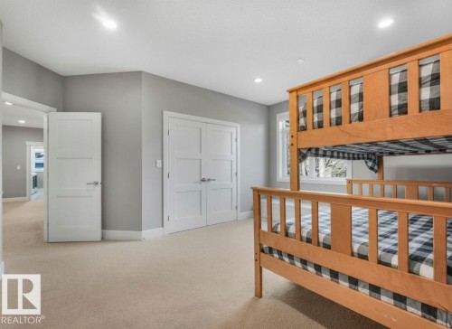 Carpeted room with recessed lighting, light gray walls, and white trim - 8927 120 Street, Edmonton, AB - Indoor Photo Showing Other Room
