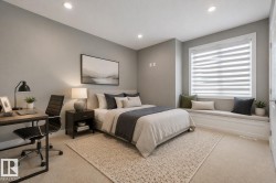 Carpeted room featuring a window with horizontal blinds and a built-in window seat - 