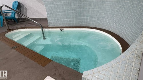 203 5125 Riverbend Road, Edmonton, AB - Indoor Photo Showing Other Room With In Ground Pool