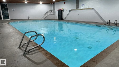 203 5125 Riverbend Road, Edmonton, AB - Indoor Photo Showing Other Room With In Ground Pool