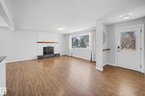 7815 156 Street, Edmonton, AB - Indoor Photo Showing Living Room With Fireplace