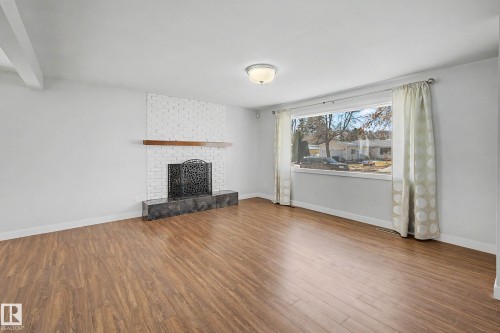 7815 156 Street, Edmonton, AB - Indoor Photo Showing Living Room With Fireplace
