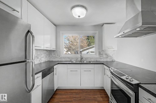 7815 156 Street, Edmonton, AB - Indoor Photo Showing Kitchen With Stainless Steel Kitchen With Double Sink