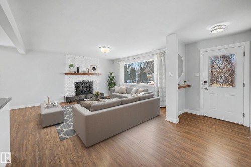 7815 156 Street, Edmonton, AB - Indoor Photo Showing Living Room With Fireplace