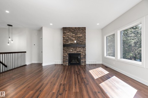 131 Bela Drive, Millet, AB - Indoor Photo Showing Living Room With Fireplace