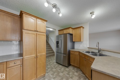 16522 56 Street, Edmonton, AB - Indoor Photo Showing Kitchen With Double Sink