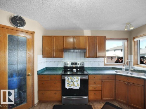 5320 156 Avenue, Edmonton, AB - Indoor Photo Showing Kitchen With Double Sink