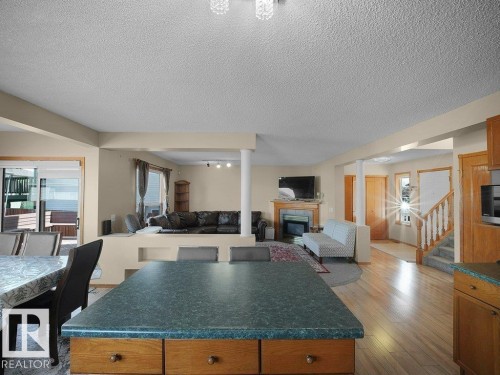 5320 156 Avenue, Edmonton, AB - Indoor Photo Showing Other Room With Fireplace