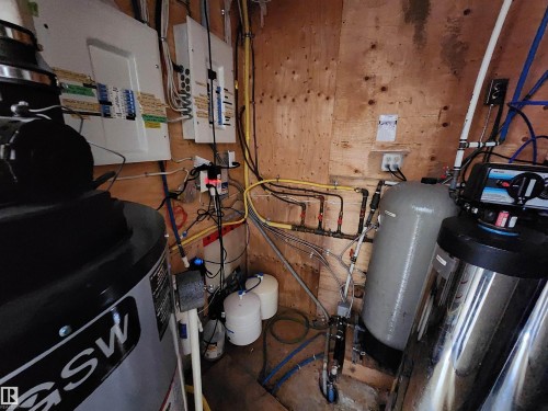 Furnace and water system - 404, 59201 Range Road 95, Rural St. Paul County, AB - Indoor Photo Showing Basement