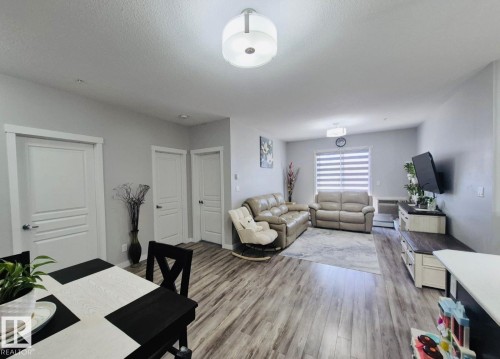 303 812 Welsh Drive, Edmonton, AB - Indoor Photo Showing Living Room