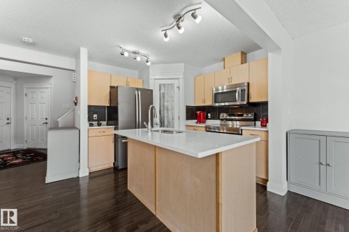 3527 11 Street, Edmonton, AB - Indoor Photo Showing Kitchen With Double Sink