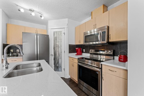 3527 11 Street, Edmonton, AB - Indoor Photo Showing Kitchen With Double Sink