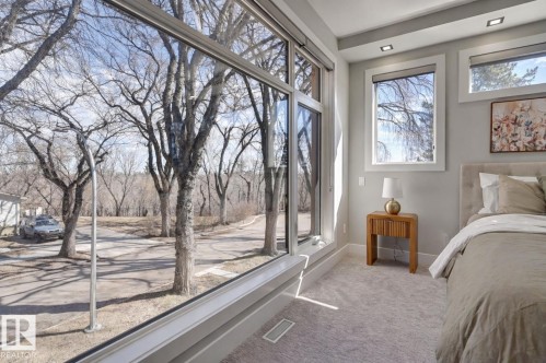 Expansive window wall offering broad outdoor views - 9741 90 Avenue, Edmonton, AB - Indoor