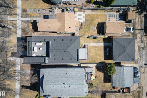 Rooftop patio featuring a privacy fence and paving stones - 9741 90 Avenue, Edmonton, AB - Outdoor
