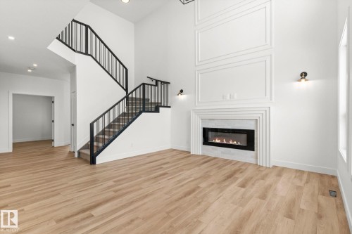 11 Arthur Way, Spruce Grove, AB - Indoor Photo Showing Living Room With Fireplace