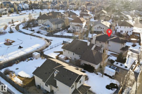 Aerial perspective of a residential property within a neighborhood featuring multiple detached homes - 6009 36 Avenue, Beaumont, AB - Outdoor With View
