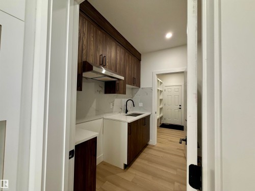 5802 Peltier Close, Beaumont, AB - Indoor Photo Showing Kitchen
