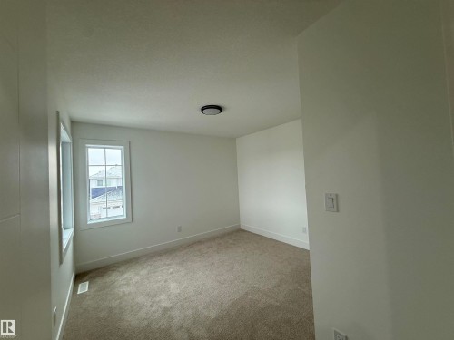 5802 Peltier Close, Beaumont, AB - Indoor Photo Showing Other Room