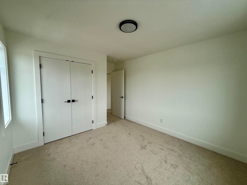 5802 Peltier Close, Beaumont, AB - Indoor Photo Showing Other Room