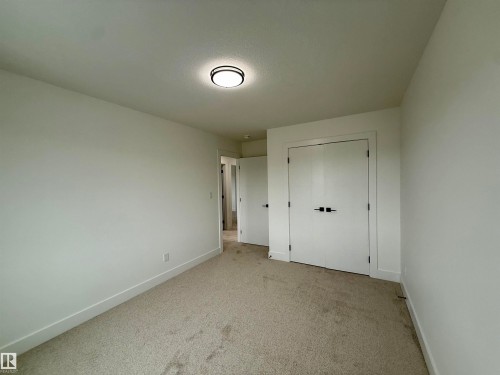 5802 Peltier Close, Beaumont, AB - Indoor Photo Showing Other Room