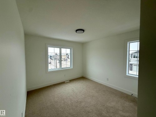 5802 Peltier Close, Beaumont, AB - Indoor Photo Showing Other Room