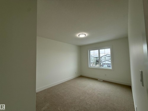 5802 Peltier Close, Beaumont, AB - Indoor Photo Showing Other Room