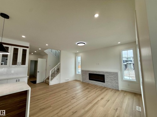 5802 Peltier Close, Beaumont, AB - Indoor With Fireplace