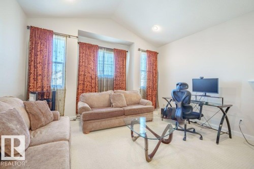 6131 12 Avenue, Edmonton, AB - Indoor Photo Showing Living Room