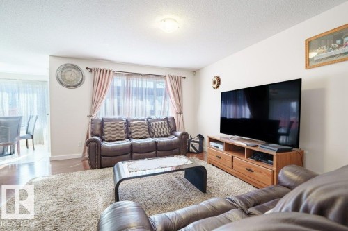 6131 12 Avenue, Edmonton, AB - Indoor Photo Showing Living Room