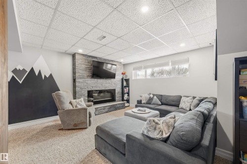15 Arbor Crescent, St. Albert, AB - Indoor Photo Showing Living Room With Fireplace