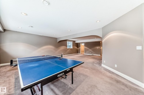 Recreation room with light colored carpet and recessed lighting - 1605 Haswell Court, Edmonton, AB - Indoor Photo Showing Other Room