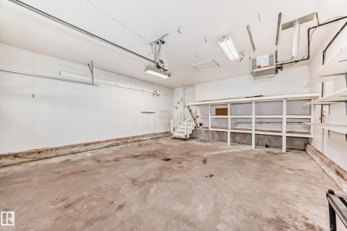 Garage featuring a heating unit - 1605 Haswell Court, Edmonton, AB - Indoor Photo Showing Garage