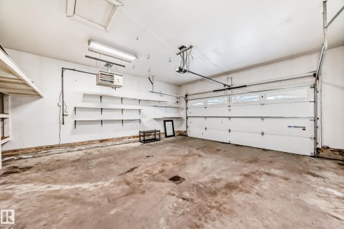 Garage with a heating unit - 1605 Haswell Court, Edmonton, AB - Indoor Photo Showing Garage