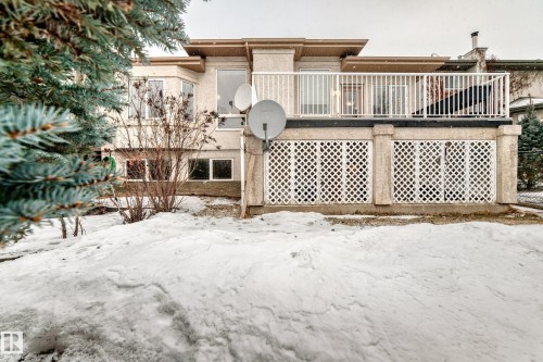 Snow covered house featuring a balcony - 1605 Haswell Court, Edmonton, AB - Outdoor With Deck Patio Veranda