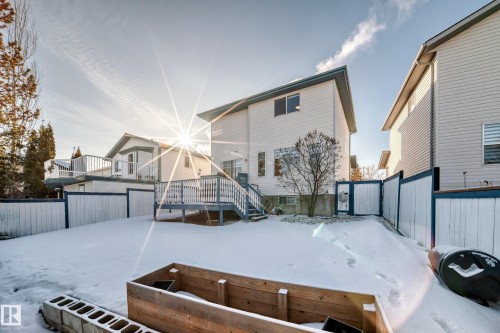 Snow covered house with a deck - 4008 37 Avenue, Edmonton, AB - Outdoor With Exterior