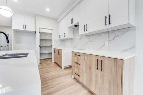 8712 181 Avenue, Edmonton, AB - Indoor Photo Showing Kitchen With Double Sink