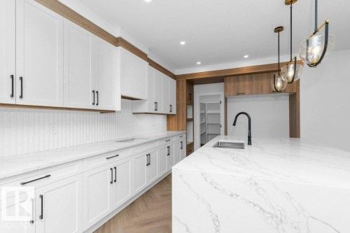 53 Lilac Bay, Spruce Grove, AB - Indoor Photo Showing Kitchen With Double Sink