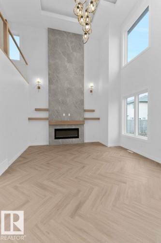 53 Lilac Bay, Spruce Grove, AB - Indoor Photo Showing Other Room With Fireplace