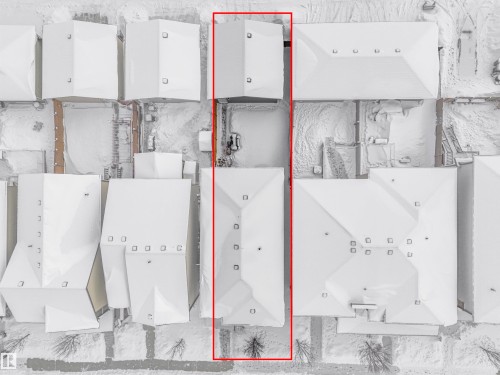 Aerial view of the property, featuring a pitched roof and a surrounding snow-covered landscape - 725 36 Street, Edmonton, AB - Other