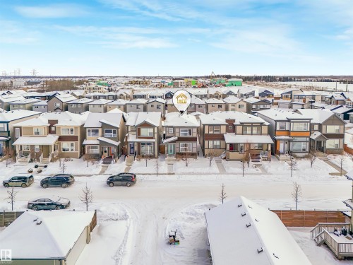 Aerial view of the property and its surrounding neighborhood, showcasing a residential street lined with houses - 725 36 Street, Edmonton, AB - Outdoor