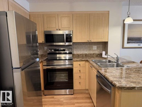 113 616 Mcallister Loop, Edmonton, AB - Indoor Photo Showing Kitchen With Stainless Steel Kitchen With Double Sink