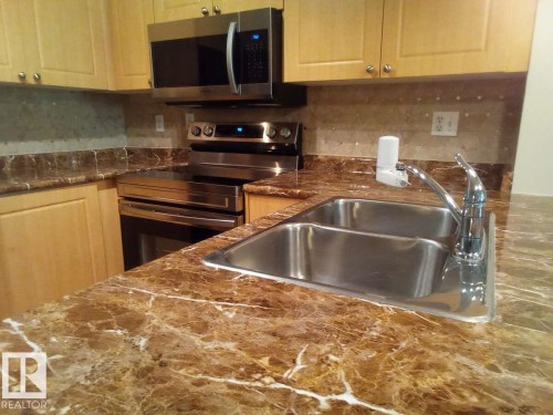 113 616 Mcallister Loop, Edmonton, AB - Indoor Photo Showing Kitchen With Double Sink