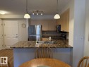 113 616 Mcallister Loop, Edmonton, AB  - Indoor Photo Showing Kitchen With Double Sink With Upgraded Kitchen 