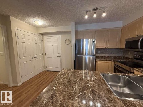 113 616 Mcallister Loop, Edmonton, AB - Indoor Photo Showing Kitchen With Double Sink