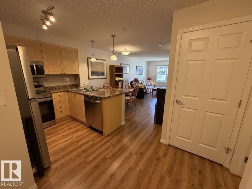 113 616 Mcallister Loop, Edmonton, AB - Indoor Photo Showing Kitchen With Stainless Steel Kitchen With Double Sink