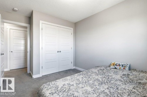 Bedroom featuring soft gray carpeting and light gray wall paint - 17451 77 Street, Edmonton, AB - Indoor Photo Showing Bedroom