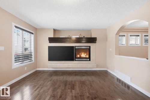 2608 Anderson Crescent, Edmonton, AB - Indoor Photo Showing Living Room With Fireplace