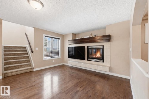2608 Anderson Crescent, Edmonton, AB - Indoor Photo Showing Living Room With Fireplace