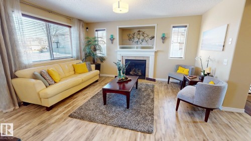 8704 175 Avenue, Edmonton, AB - Indoor Photo Showing Living Room With Fireplace